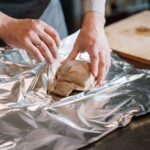 Can you store cheese in aluminum foil?