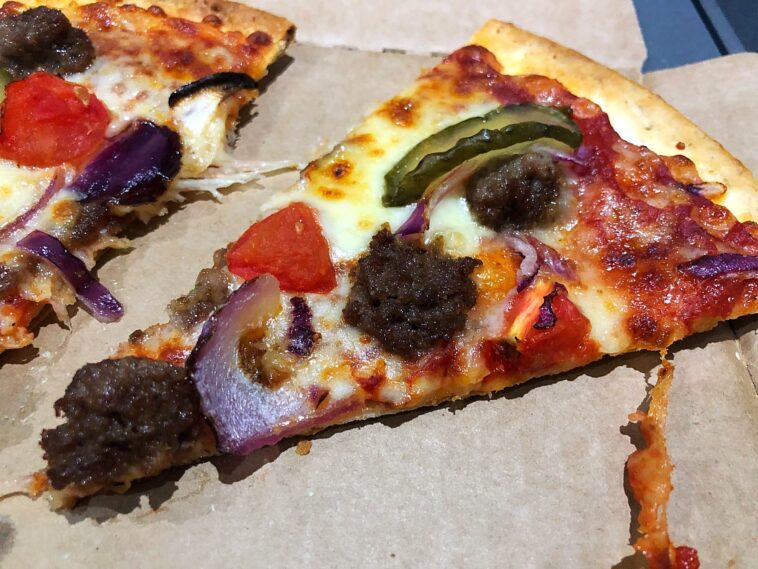 Do Dominos use real cheese?