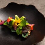 Does Atomix have Michelin stars?