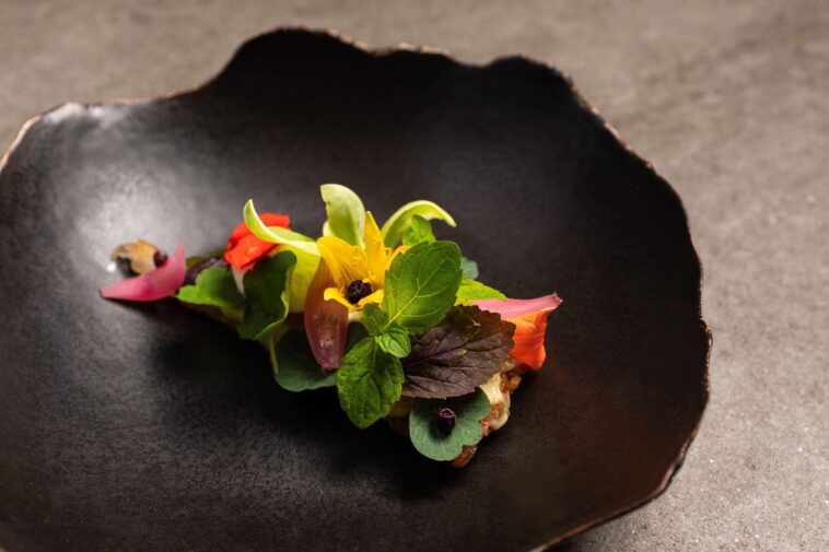 Does Atomix have Michelin stars?