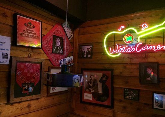 Does Willie Nelson own Texas Roadhouse?
