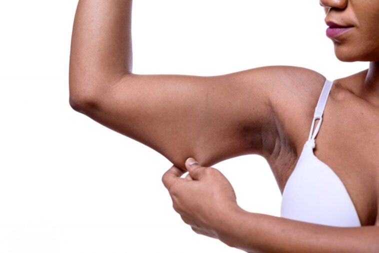 How can I tighten loose skin on my arms?