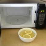 How do I clean the inside of my new microwave?