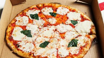 How do I reheat pizza to make it taste better?