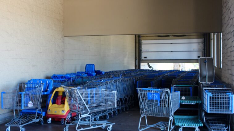 How do Walmart shopping carts lock?