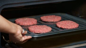 How do you broil burgers in the oven?