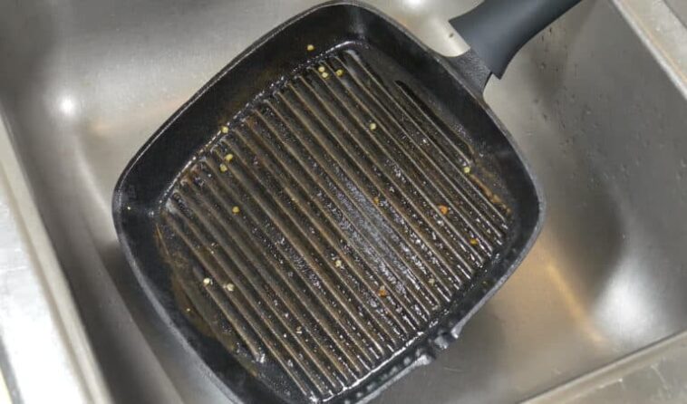 How do you clean a cast iron grill pan?