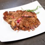 How do you cook prime grade steak?