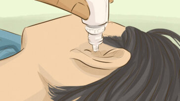 How do you drain fluid from your middle ear at home?