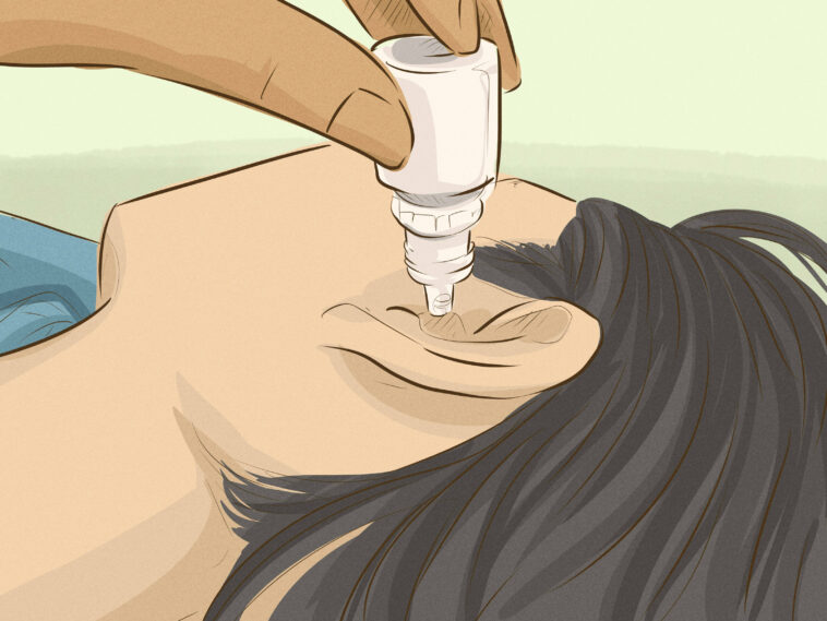How do you drain fluid from your middle ear at home?