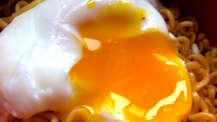 How do you drop an egg into ramen?