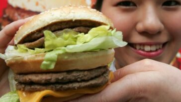 How do you eat a Mac burger?