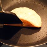 How do you flip pancakes?