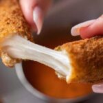 How do you fry mozzarella sticks without exploding?