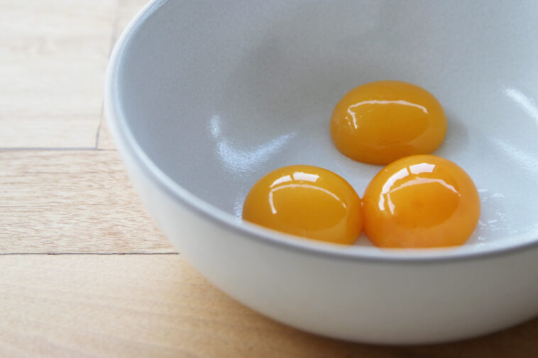How do you get golden yolk eggs?
