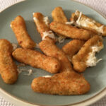 How do you pan fry frozen mozzarella sticks?