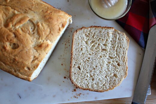 How do you reduce bitterness in whole wheat bread?