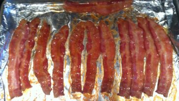 How do you reheat cooked bacon?