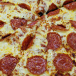 How do you reheat frozen Little Caesars pizza?