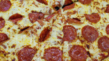 How do you reheat frozen Little Caesars pizza?