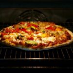 How do you reheat pizza at 400 degrees?