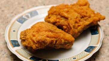 How do you reheat rice in the microwave without drying it out?