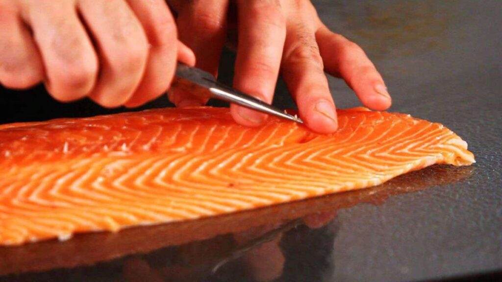 How do you remove bones from salmon?