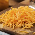 How do you store shredded cheese?