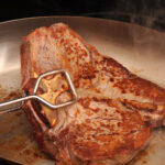 How long do you pan fry a 2 inch steak?