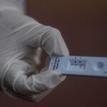 How long will I test positive for COVID after having it?