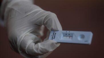 How long will I test positive for COVID after having it?