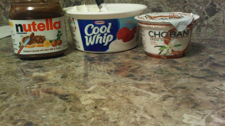 How many calories are in a half cup of Cool Whip?