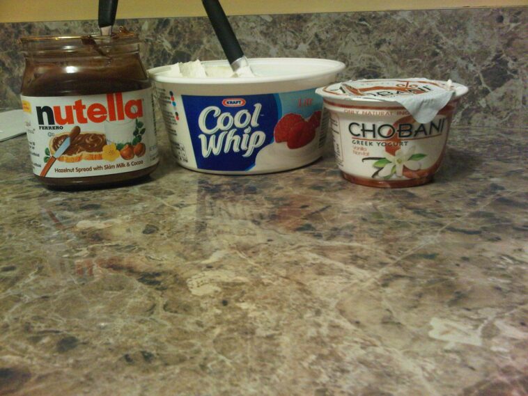 How many calories are in a half cup of Cool Whip?