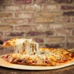 How many calories are in a large pepperoni pizza from Hungry Howies?