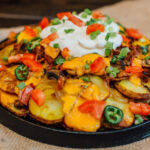 How many calories are in a plate of Nachos?