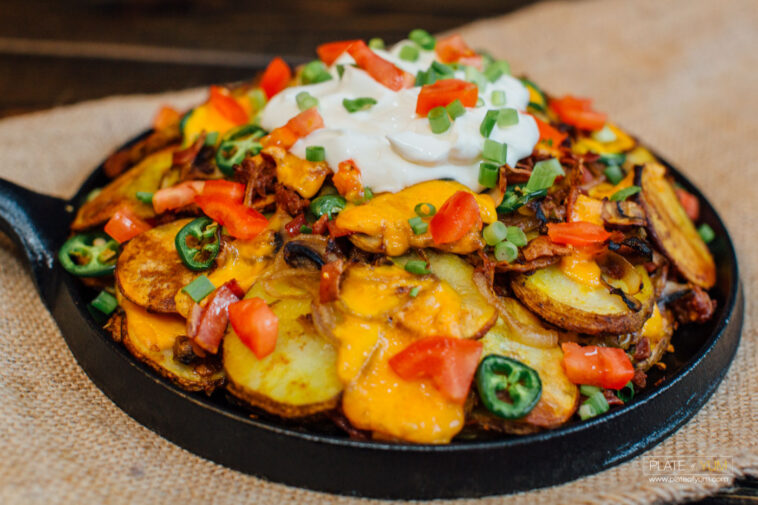 How many calories are in a plate of Nachos?