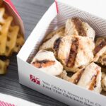 How many calories in a Chick-fil-A grilled chicken biscuit?