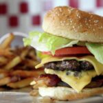 How many calories in a Five Guys cheeseburger all the way?