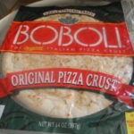 How many calories in store bought pizza dough?