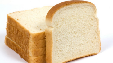 How many calories is a piece of sliced white bread?