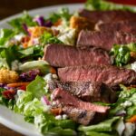 How many calories is a steak salad from Texas Roadhouse?