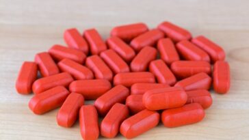 How much OJ should I take with iron?