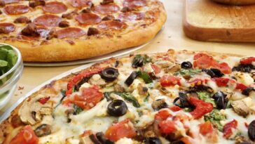 How much is a large Domino's veggie pizza?