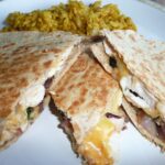 How much protein is in a Chicken Quesadilla from Taco Bell?