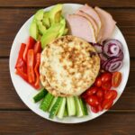 Is 100 carbs a day low-carb?