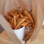 Is a basket of fries bigger than a large fry?