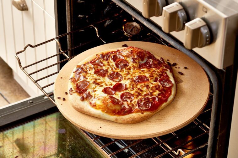 Is a pizza stone good for reheating pizza?