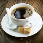 Is it better to drink regular or decaf coffee?
