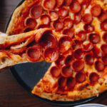 Is it better to eat pizza hot or cold?