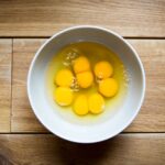 Is it safe to eat a red egg yolk?